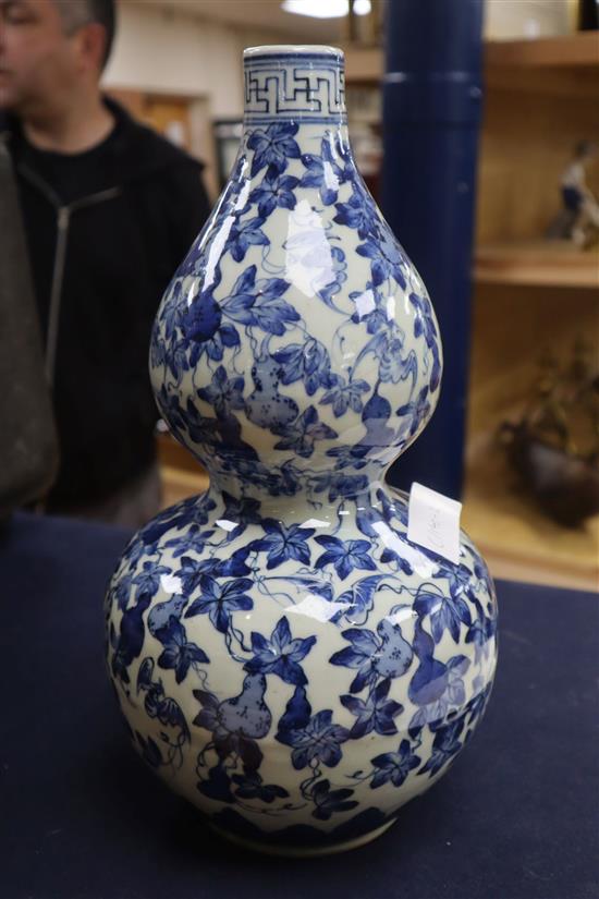 A Chinese blue and white double gourd vase height 34cm